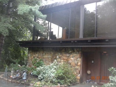 Glass, stone and the entrance facade