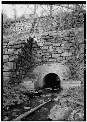 Indian Creek culvert, vertical view of stream and stone portal