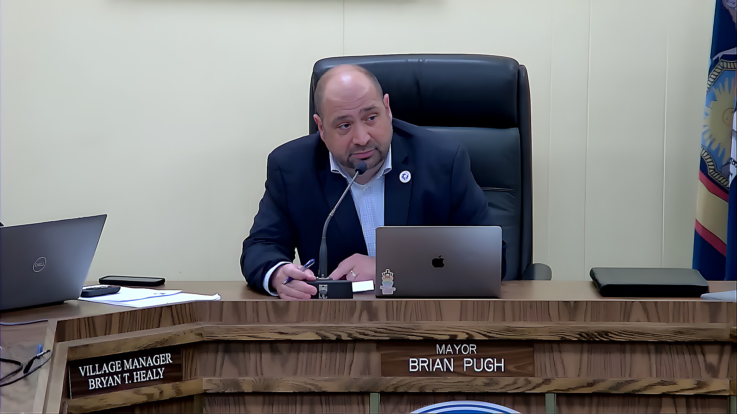 Mayor Brian Pugh and Village Manager Bryan Healy during discussion of the Maple Street flashing beacon at the Board Of Trustees meeting.