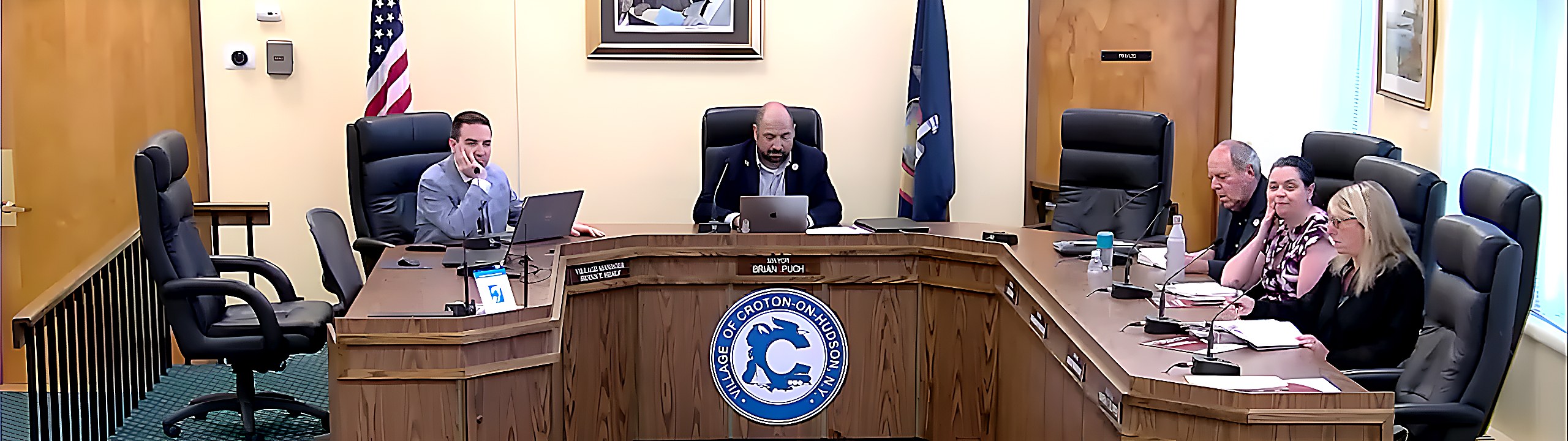 Village Manager Bryan Healy and Mayor Brian Pugh during discussion of the source of the loud music complaints at the Board Of Trustees meeting.