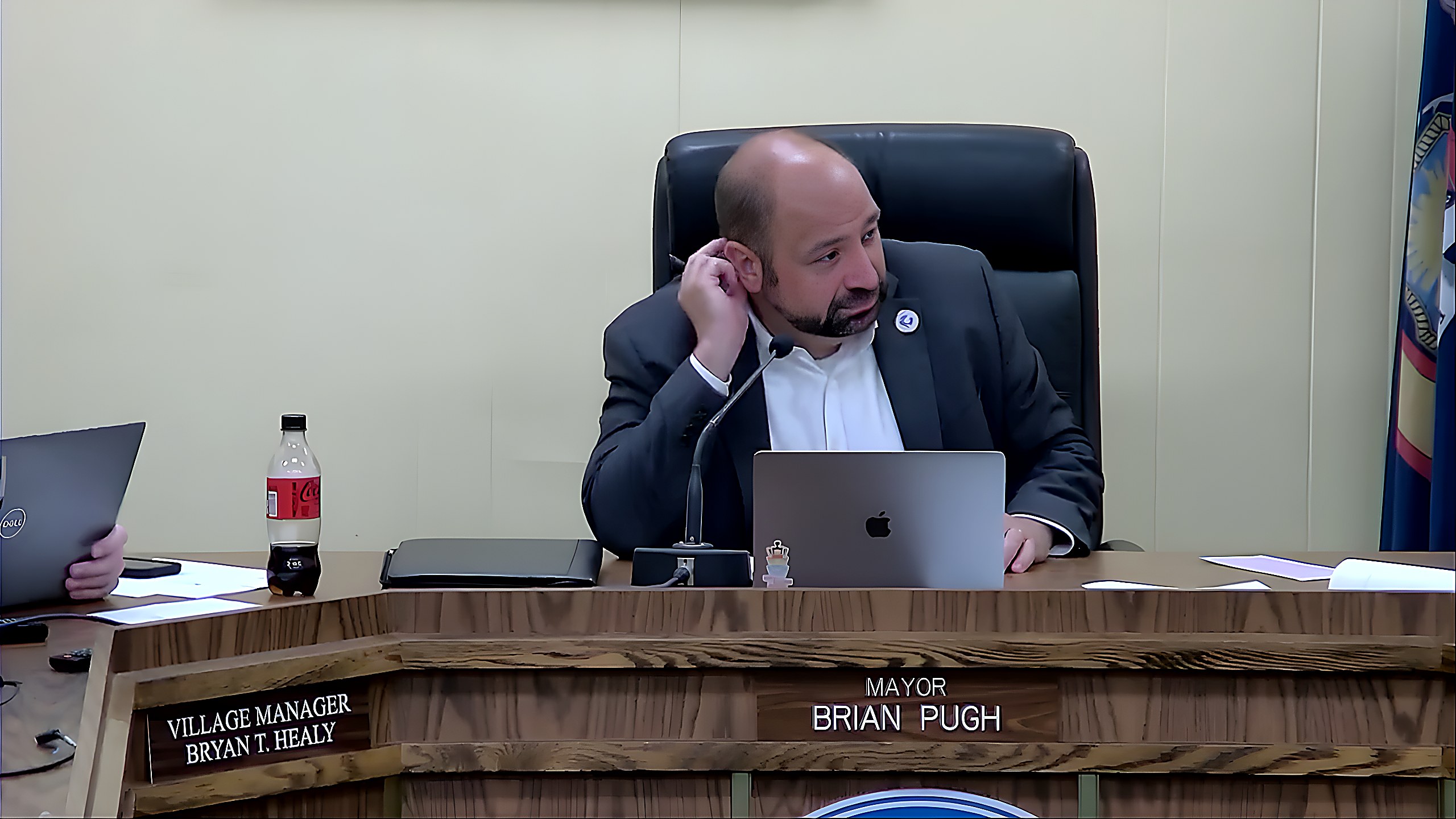 The Board of Trustees convenes for the July 1 meeting at the Stanley H. Dickinson Municipal Building.