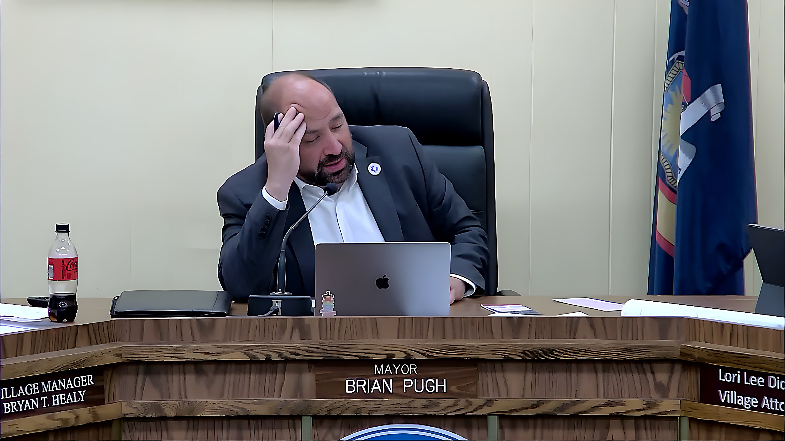 Village Board members discuss the agenda during the July 1st meeting.