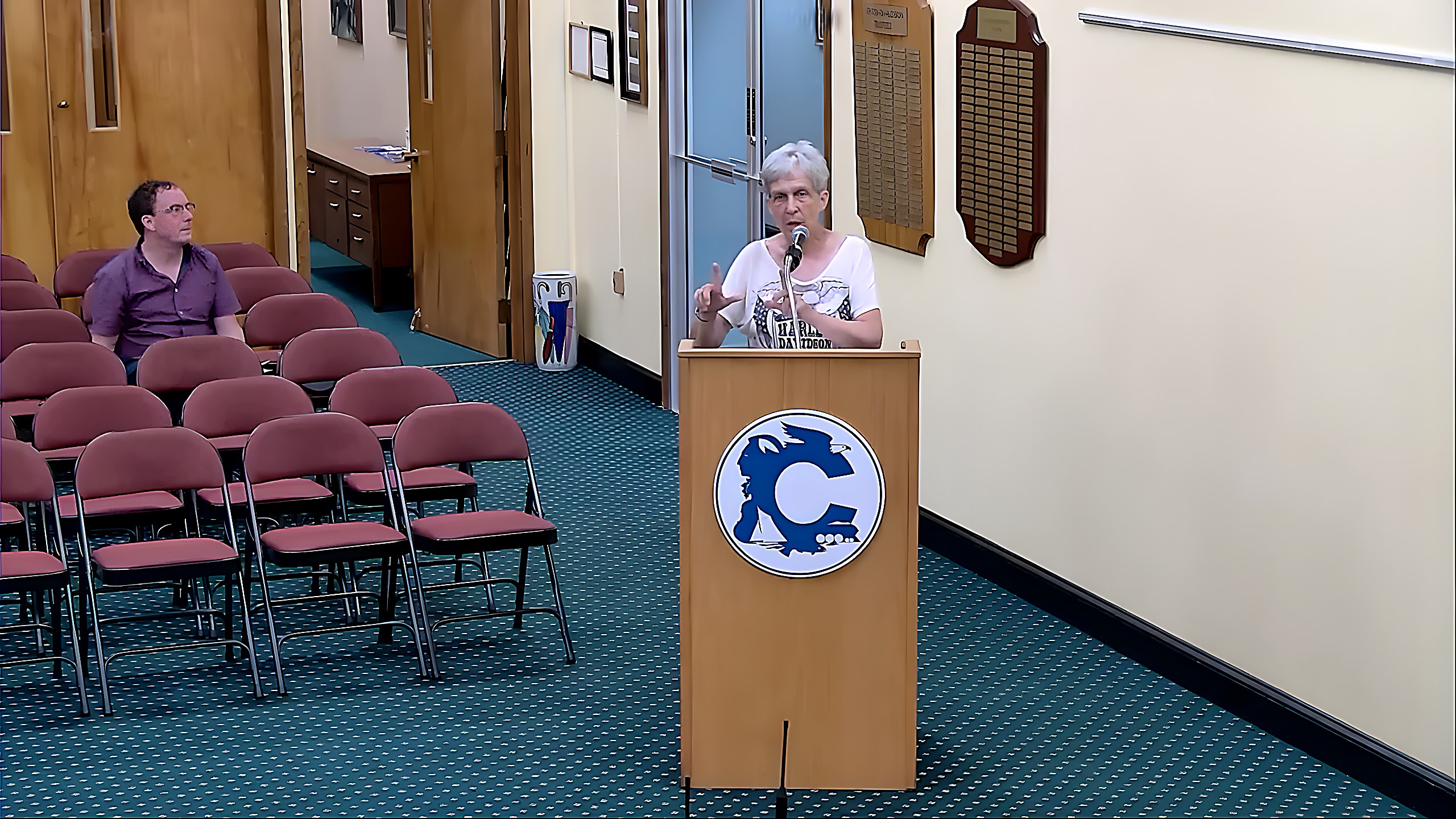 Gwen Cianfaglione recalls the old Quaker Bridge during the public comment period.