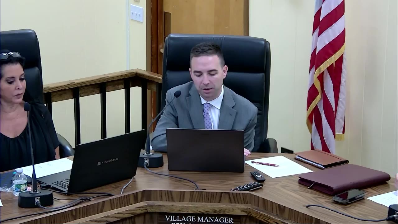 Village Manager Bryan Healy discusses the street-resurfacing schedule at the September 2 trustees meeting.