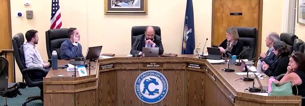 Village trustees consider the proposed sign-law changes at their September 9 work session.