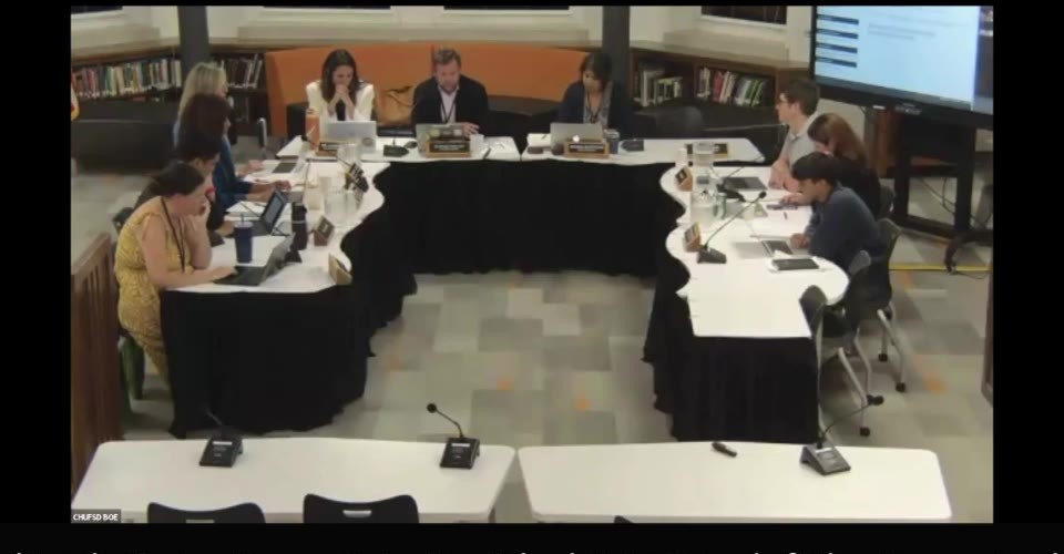 Board members at the September 17 meeting during discussion of the district's communications agreement.