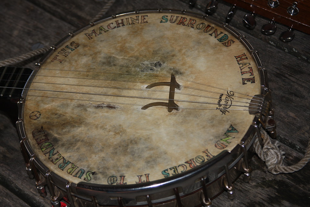 'This machine surrounds hate and forces it to surrender.' Pete Seeger banjo