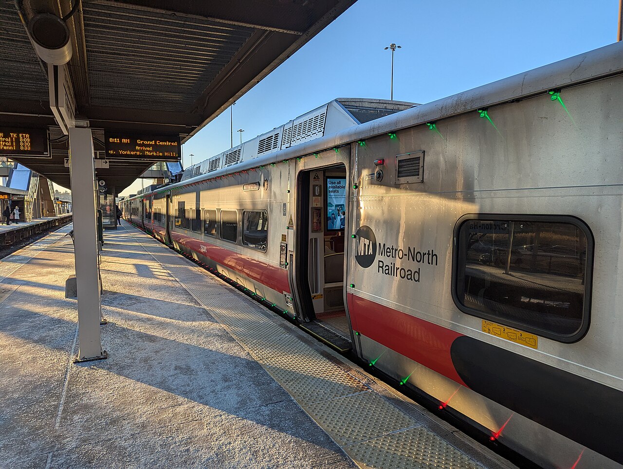 New Haven Line railcars at Croton-Harmon, holiday decor.jpg