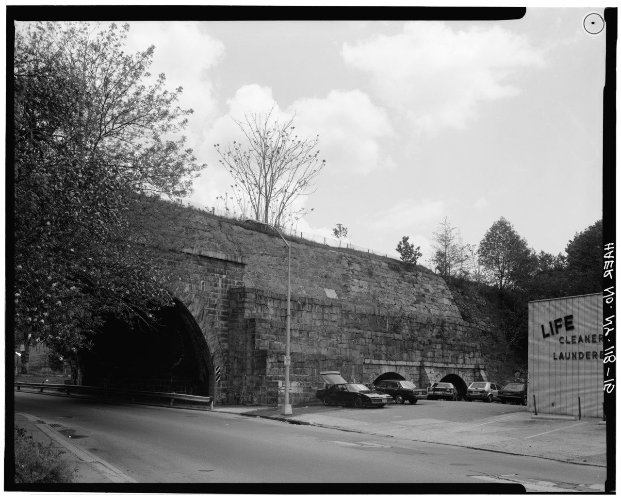 SOUTH SIDE OF AQUEDUCT, LOOKING EAST, SHOWING NEPPERHAN AVENUE AND SAW MILL RIVER ARCHES - Old Croton Aqueduct, Saw Mill River Culvert, Spanning Nepperhan Avenue, Yonkers, HAER NY,60-YONK,1A-15.tif